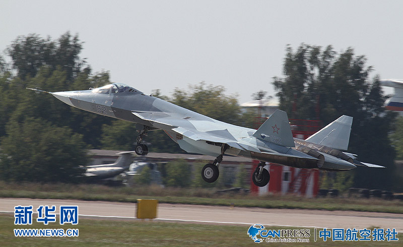 The new twin-engine T-50 fighter flies Sunday near Moscow. MAKS 2011, an international air show, will be held in the small science town of Zhukovskiy, 25 miles southeast of Moscow from Aug. 16-21, 2011.[Xinhuanet]