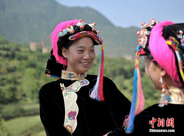 Danba County of China's Sichuan province is known as the 'Beauty Village.' Girls born there are considered to be beautiful, possibly due to its favorable environment and climate. [Photo/Chinanews.com] 