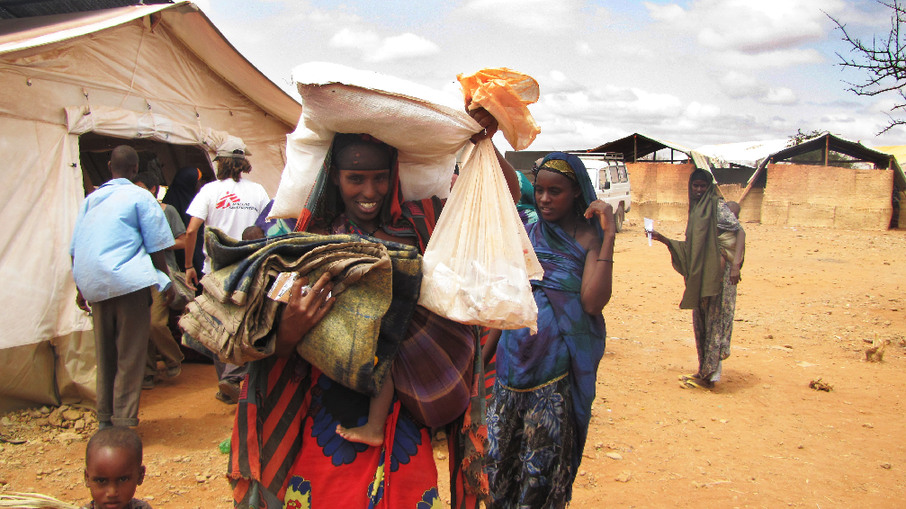 Bags of therapeutic food, flour and a blanket. Additional food is given out so that the therapeutic food for a malnourished child is not shared out with other siblings or other members of the family. [Sisay Zerihun/MSF]