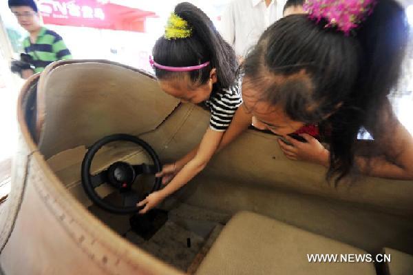 #CHINA-JINAN-SHOE-SHAPED ELECTRIC CAR (CN) 