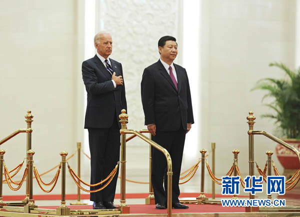 Xi hosted a red-carpet welcome ceremony for Biden, who is on his first official visit to China as U.S. vice president. 