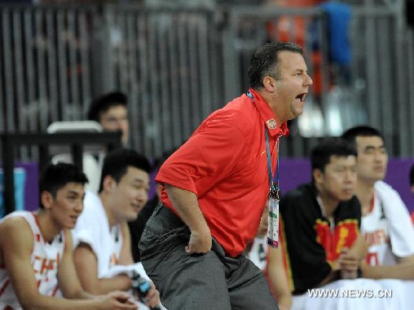 Head coach of the Chinese team Robert Donewald reacts during the match between China and Serbia in the London International Basketball Invitational at the Basketball Arena in the Olympic Park, London, Britain, Aug. 17, 2011. China lost 53-87. (Xinhua/Zeng Yi) 