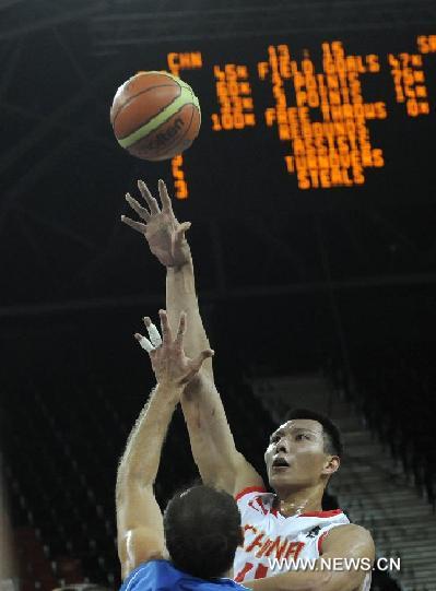 China's Yi Jianlian shoots during the match against Serbia in the London International Basketball Invitational at the Basketball Arena in the Olympic Park, London, Britain, Aug. 17, 2011. China lost 53-87. (Xinhua/Zeng Yi) 