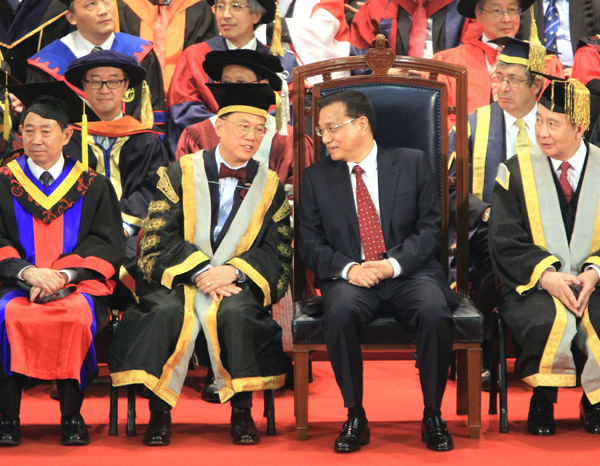 China's Vice-Premier Li Keqiang (Front R2) attends a celebration ceremony marking the centennial anniversary of the founding of the Hong Kong University, Hong Kong, Aug 18, 2011. [Edmond Tang/chinadaily.com.cn]