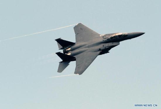 An F-15E performs on the Tenth Russia International Aerospace Exhibition in Moscow, Russia on Aug. 16, 2011. The Exhibition will last for six days, with the participation of 793 companies from 40 nations and regions.