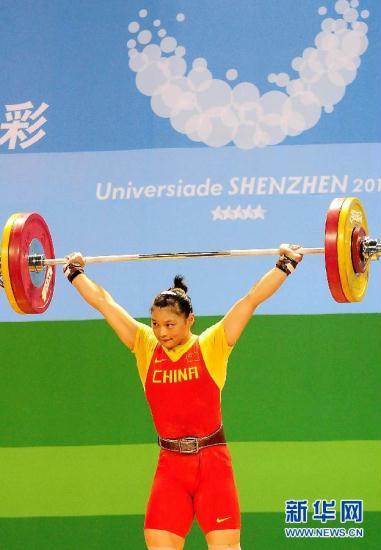 Kang Yue of China tops in women's 69kg weightlifting.