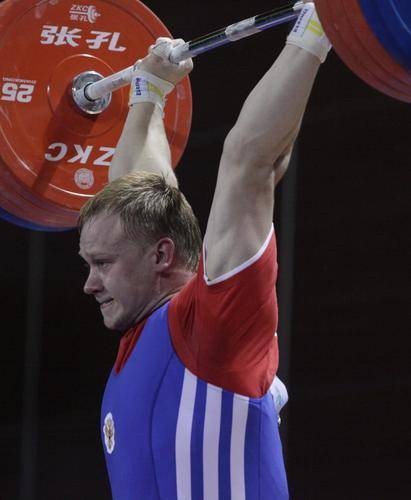 Muratov Gennady, Russia, wins the gold medal in the men's 105kg weightlifting at the Univeriade in Shenzhen on Thursday.