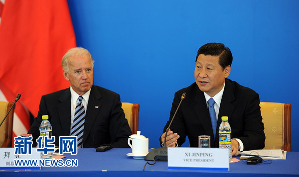 Vice President Xi Jinping (R) and his U.S. counterpart Joe Biden (L) on Friday attended a U.S.- China business dialogue aiming to enhance bilateral trade and economic ties. 