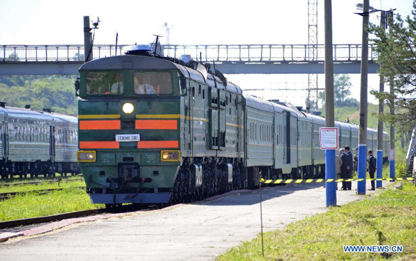 A train, transporting North Korean leader Kim Jong-il, arrives at Khasan Station after crossing the border between North Korea and Russia, near Russia's far eastern city of Vladivostok August 20, 2011. North Korean leader Kim Jong-il arrived in Russia on a special train on Saturday as the isolated state tries to reach out to regional powers and seek economic aid.