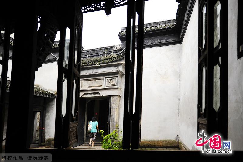 With a history of 1,200-year, Wuzhen is about one hour's drive from Hangzhou,the capital of Zhejiang Province.The small town is famous for the ancient buildings and old town layout, where bridges of all sizes cross the streams winding through the town. [China.org.cn]