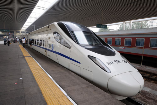 A bullet train is ready to depart at Taiyuan Railway Station in Taiyuan, north China's Shanxi Province, Aug. 28, 2011. China started to implement a new operation plan for all bullet trains across the country on Sunday, rescheduling trains to run at slower speeds over safety concerns. [Yan Yan/Xinhua]