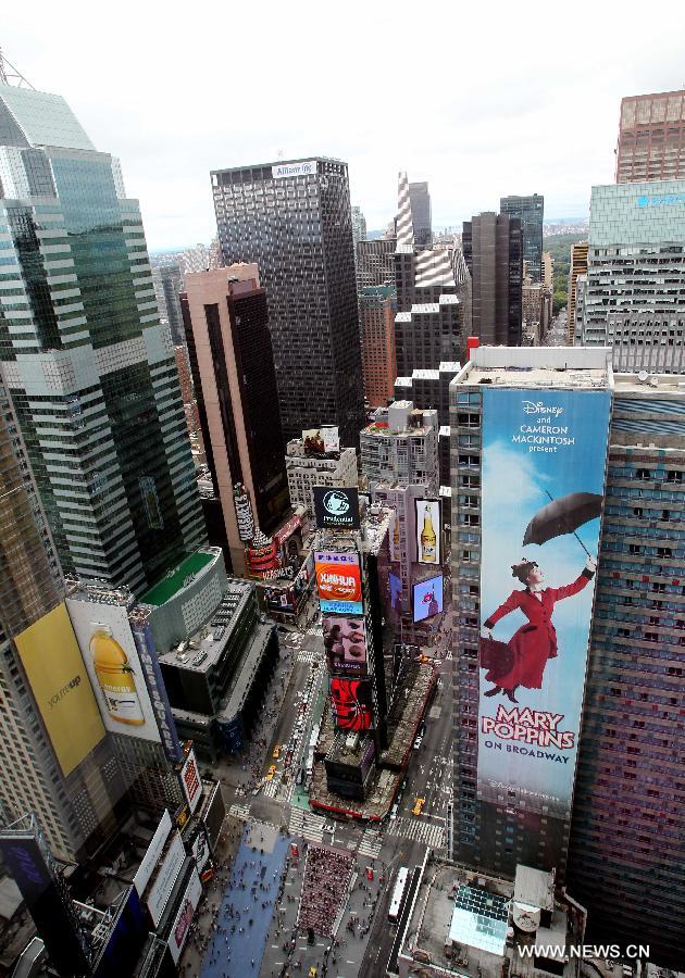 The Times Square is seen in New York, the United States, Aug. 28, 2011. U.S. Homeland Security Secretary Janet Napolitano said on Sunday that the worst of Hurricane Irene was over but communities still in Irene's path should continue to be vigilant. It lost some strength as it hit the New York City Sunday morning.