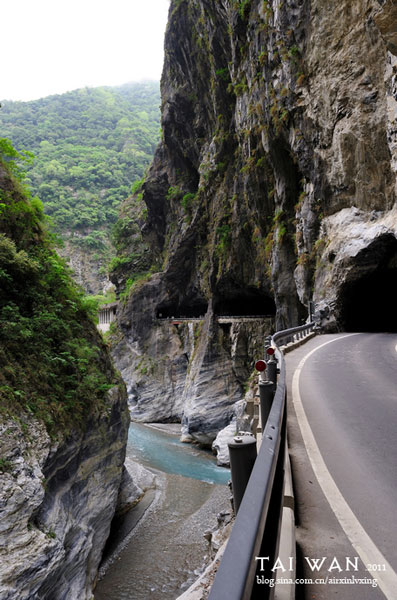 A tunnel passes through a mountain in the park. 