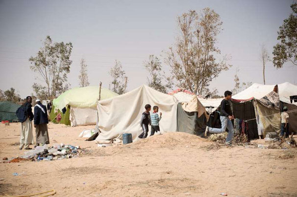 Displaced people in eastern Libya outside the town of Ajdabiya [UN] 