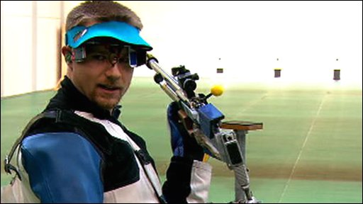 Matthew Emmons has a look of disbelief after firing at the wrong target on his last shot in the men's 50-meter rifle 3-position final at Athens. 