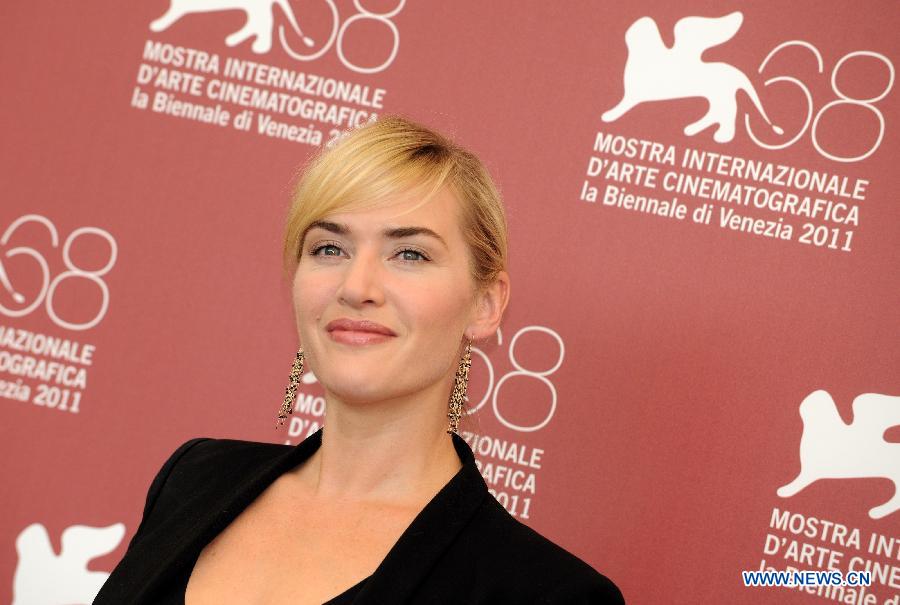 Actress Kate Winslet poses during the photo-call for the TV miniseries 'Mildred Pierce' at the 68th Venice Film Festival at Venice, Italy, Sept. 2, 2011. [Wang Qingqin/Xinhua] 
