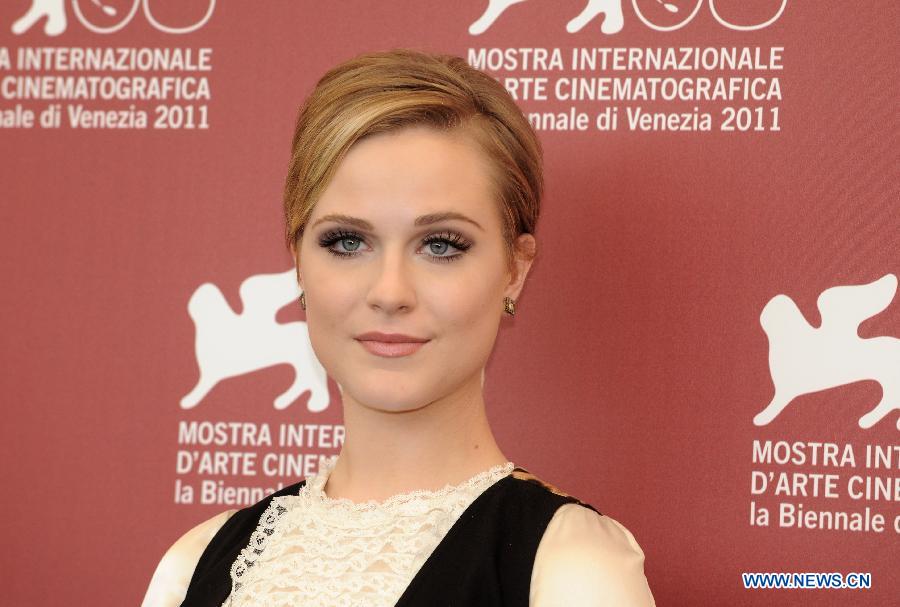 Actress Evan Rachel Wood poses during the photo-call for the TV miniseries 'Mildred Pierce' at the 68th Venice Film Festival at Venice, Italy, Sept. 2, 2011. [Wang Qingqin/Xinhua] 