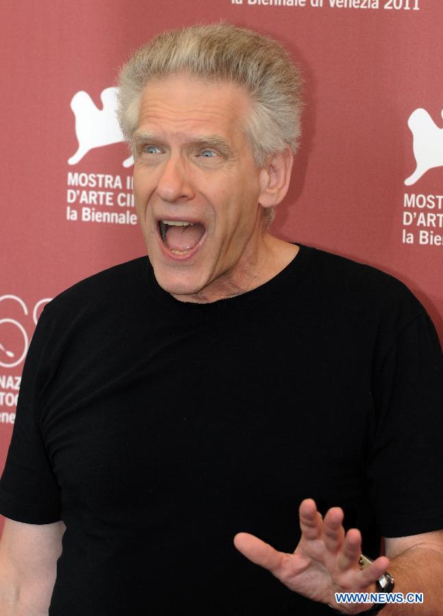 Canadian director David Cronenberg poses during the photo-call for the film 'A Dangerous Method' at the 68th Venice International Film Festival at Venice, Italy, Sept. 2, 2011. [Wang Qingqin/Xinhua]