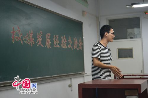 Willis Ameragat, one of the student leaders for the US-China Youth RME Partnership Inner Mongolia team, welcomes attendees at a person-to-person exchange at Inner Mongolia Agricultural University in Hohhot on Aug. 30, 2011.
