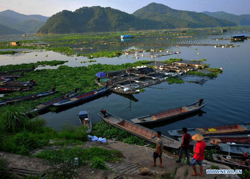 Photo taken on Sept. 3, 2011 shows a aquaculture base at Shuikou Township section of the Minjiang River in Gutian County in southeast China's Fujian Province.