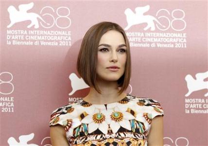 Actress Keira Knightley poses during a photocall for her film ''A Dangerous Method'' which is in competition at the 68th Venice Film Festival September 2, 2011