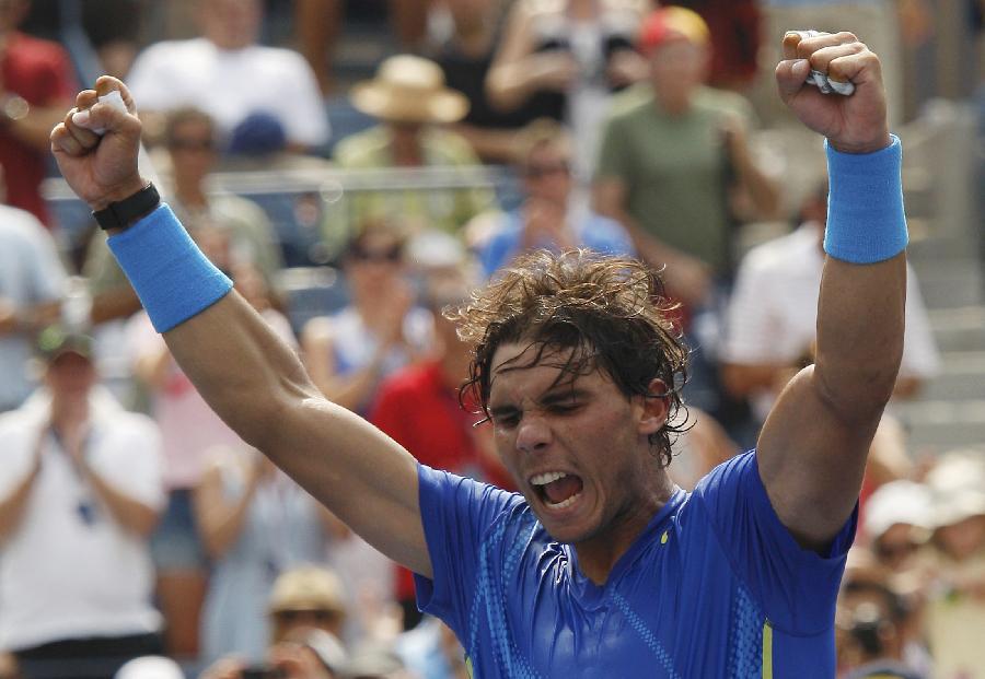 Rafael Nadal of Spain celebrates his win over David Nalbandian of Argentina during their match at the U.S. Open tennis tournament in New York, U.S., Sept. 4, 2011. (Xinhua/Reuters Photo) 
