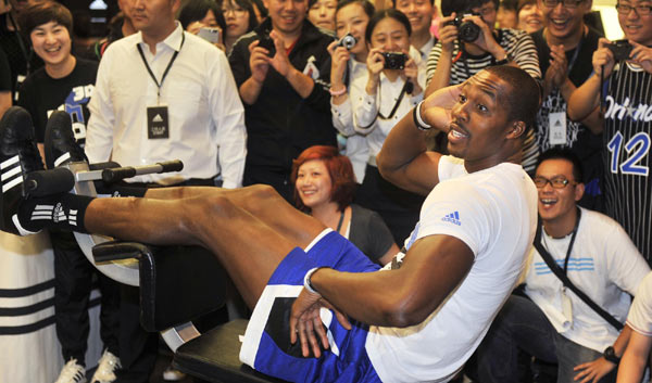 NBA star Howard gets a real kiss during China tour