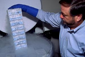 Geneticist Oliver Ryder displays specimens from his frozen zoo. [San Diego Zoo] 