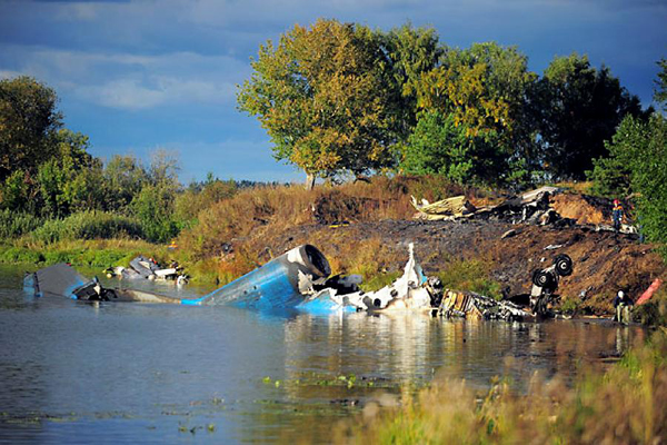 Photo provided by the website of Russian Emergency Situations Ministry on Sept. 7, 2011 shows the site where a plane crashed near central Russian city of Yaroslavl. A YAK-42 passenger plane carrying 45 people crashed Wednesday after taking off near central Russian city of Yaroslavl, killing at least 43 people aboard, said the Emergency Situations Ministry.