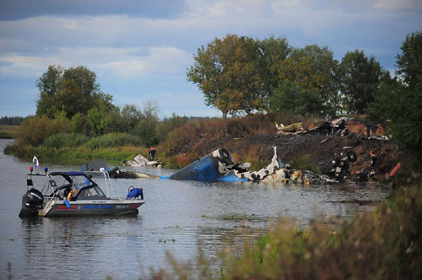 Photo provided by the website of Russian Emergency Situations Ministry on Sept. 7, 2011 shows the site where a plane crashed near central Russian city of Yaroslavl. A YAK-42 passenger plane carrying 45 people crashed Wednesday after taking off near central Russian city of Yaroslavl, killing at least 43 people aboard, said the Emergency Situations Ministry.