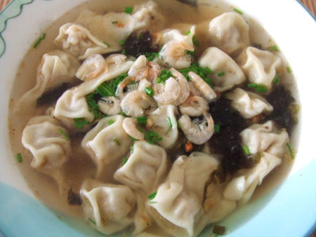 Wonton soup with three fresh delicacies, one of the 'top 10 most famous Shanghai snacks' by China.org.cn.