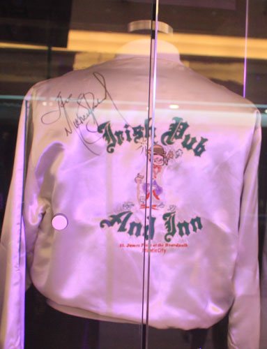 A satin jacket, worn and signed by singer Michael Jackson, is on display at the New World Department Store in Beijing Sept. 8, 2011.