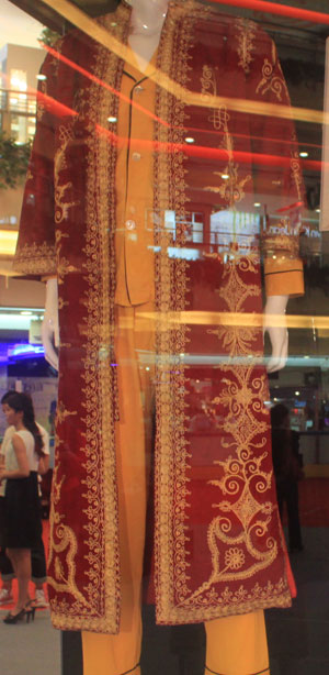 A night gown worn by singer Elvis Presley is on display at the New World Department Store in Beijing Sept. 8, 2011.