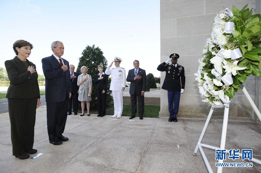 Former US president George W. Bush and his wife Laura lay a wreath at the Pentagon to mark the 10th anniversary of the Sept. 11 attacks, on Sept. 10, 2011.