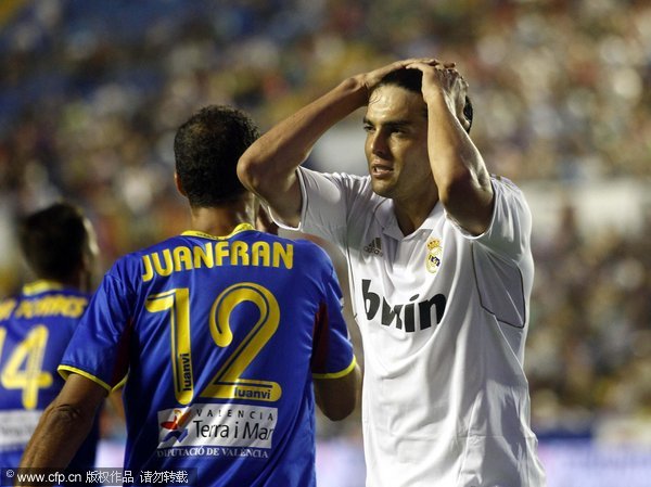 Kaka of Real Madrid (r) reacts after missing an opportunity during their La liga match against Levante, Sunday, Sept. 18, 2011.