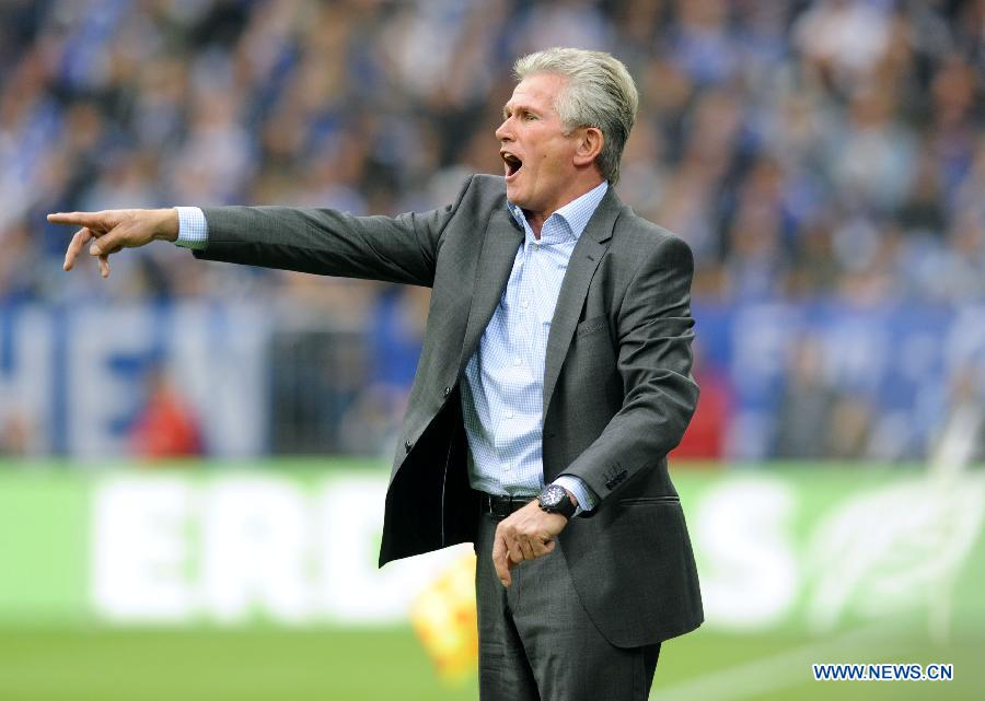 Coach Jupp Heynckes of Bayern Muenchen reacts during German Bundesliga football match between FC Schalke 04 and FC Bayern Muenchen in Gelsenkirchen, Germany, Sept. 18, 2011. FC Bayern won the match 2:0. [Xinhua/Uwe Kraft]