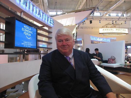 Danfoss A/S' Chairman Jorgen M. Clausen sits at the Village area on Sept 16, 2011, during the World Economic Forum Annual Meeting of the New Champions in Dallian, Liaoning province. [chinadaily.com.cn] 