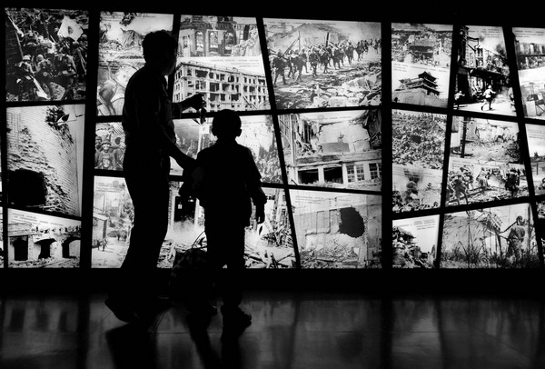 An exhibition depicting Japanese atrocities in China opened in the Museum of the War of Chinese People's Resistance Against Japanese Aggression in Beijing on Sunday. [Photo by Luo Xiaoguang / Xinhua]