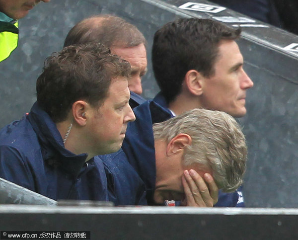 Arsenal manager Arsene Wenger reacts on the touchline.
