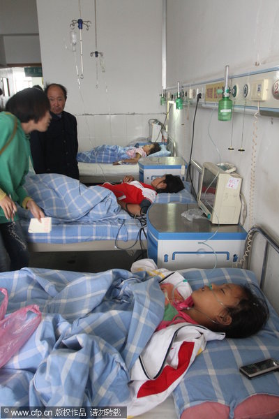 Three girls are hospitalized following their attempted suicide after failing to do their homework in Jiujiang, East China's Jiangxi province, Sept 19, 2011.