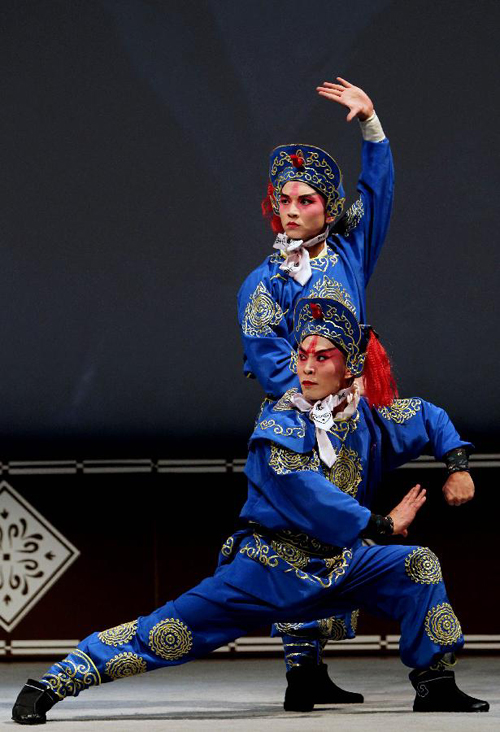 Artists perform in the Beijing Opera 'Yan Dang Mountain' at the Lincoln Center in New York, the United States, Sept. 17, 2011. 