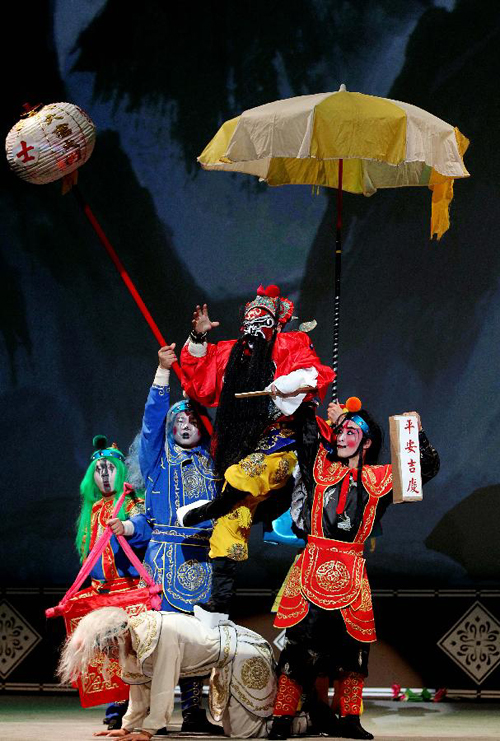 Artists perform in the Beijing Opera 'Zhong Kui Marries off His sister' at the Lincoln Center in New York, the United States, Sept. 17, 2011. 