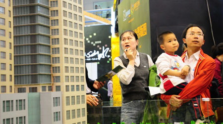 Visitors at a recent property show in Beijing.