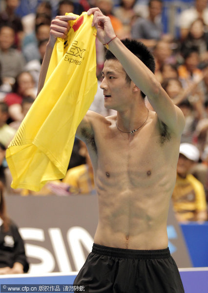 Chen Long of China celebrates after winning over Lee Chong Wei of Malaysia in the men's singles final at Japan Open in Tokyo on Sunday, Sept. 25, 2011.
