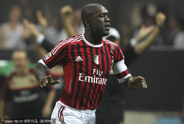 Clarence Seedorf of AC Milan celebrates after scoring the opening goal during the Serie A match between AC Milan and AC Cesena at Stadio Giuseppe Meazza on September 24, 2011 in Milan, Italy.