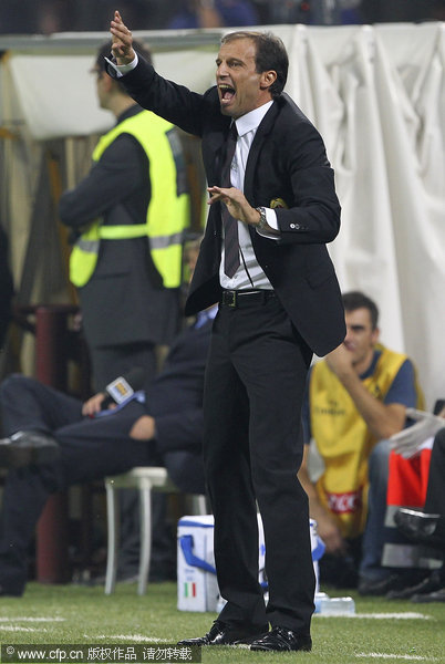 AC Milan coach Massimiliano Allegri issues instructions to his players during the Serie A match between AC Milan and AC Cesena at Stadio Giuseppe Meazza on September 24, 2011 in Milan, Italy.