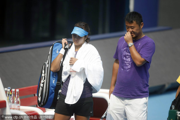 Li Na and her husband, Jiang Shan, practiced at Lotus Court to warm up for the upcoming China Open on 25 September, 2011.