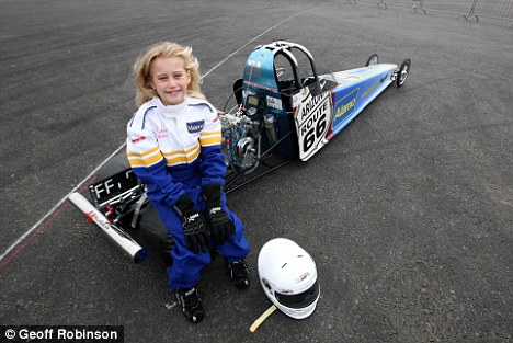 Need for speed: Belle Wheeler, pictured with her 15ft dragster, cruised through her driving test a day after turning eight. [Agencies]