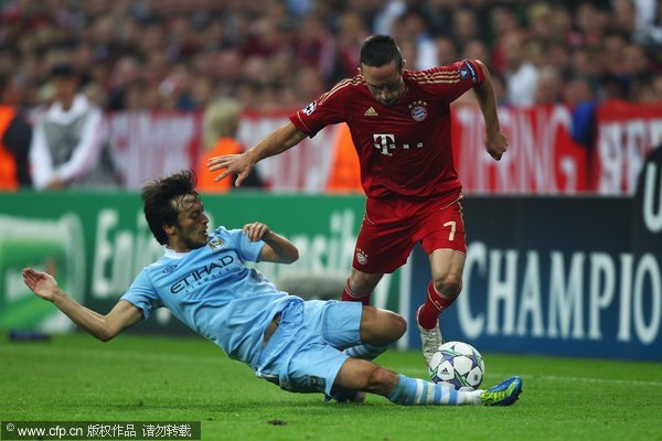 Franck Ribery of Bayern is challenged by David Silva of Manchester City during the UEFA Champions League group A match between FC Bayern Muenchen and Manchester City at Allianz Arena on September 27, 2011 in Munich, Germany.