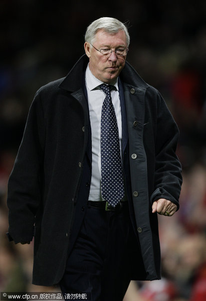 Manchester United manager Alex Ferguson reacts after drawing with FC Basel in their Champions League Group C soccer match at Old Trafford on Tuesday, Sept. 27, 2011.